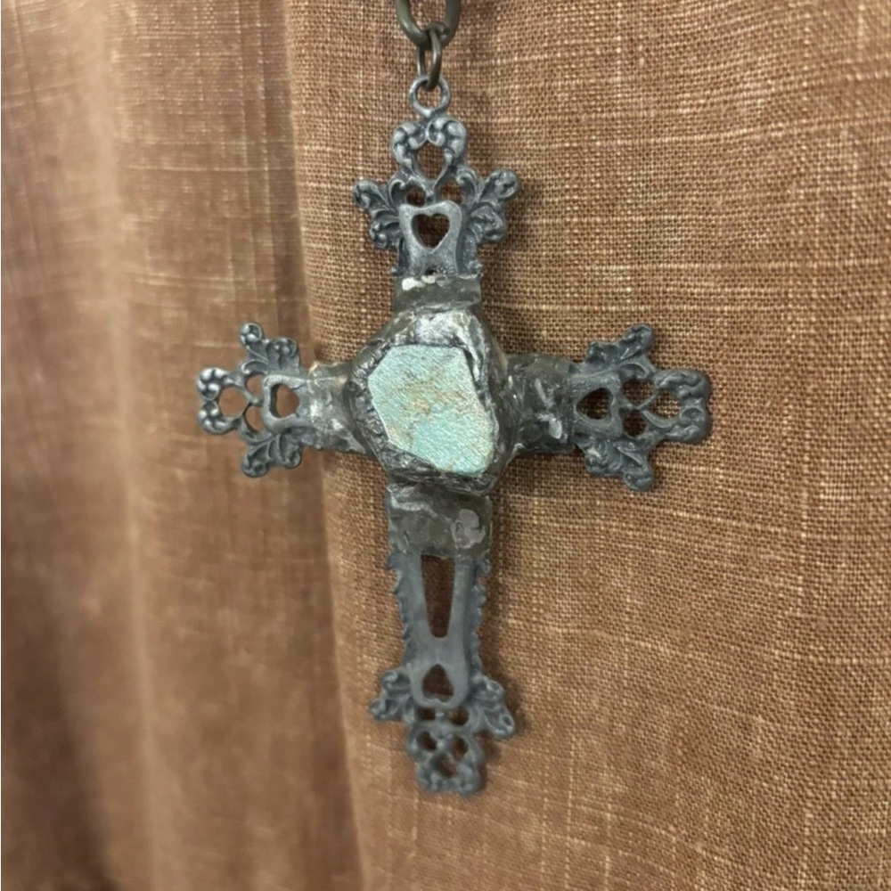 A Rare Bird Cross Necklace